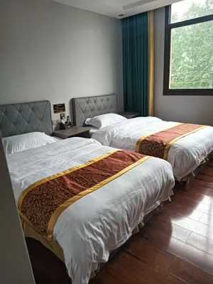 Xinxing Hotel Hotels in Huangping