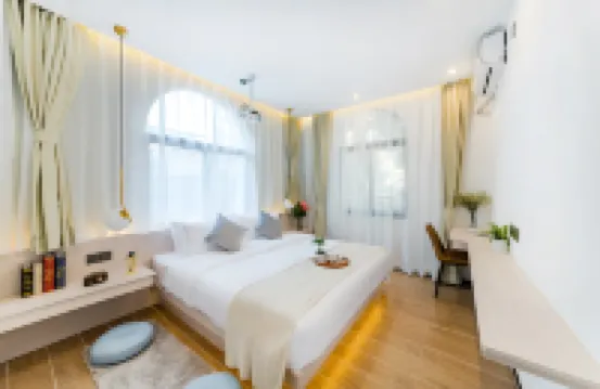 AMOY·Happiness Home Inn (Cozy Retreat Near the Sea, Huandao South Road) Hotel a 