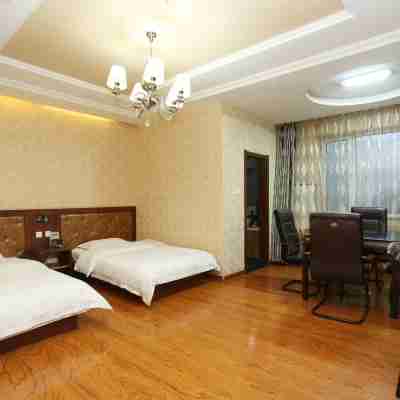 樺都現代商務賓館(蛟河精品店) Rooms