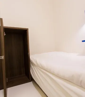 ห้องมินิพอดเตียงเดี่ยว สูบบุหรี่ได้บางส่วน