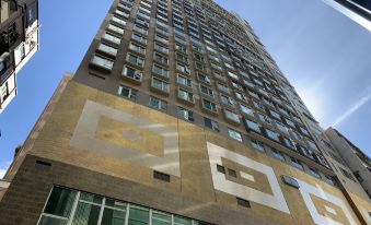 The sentence lacks a clear subject and verb, making it difficult to revise at Ramada Grand Tsim Sha Tsui