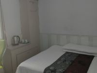 泰来森林休闲旅馆 - 普通大床房(公共卫浴)