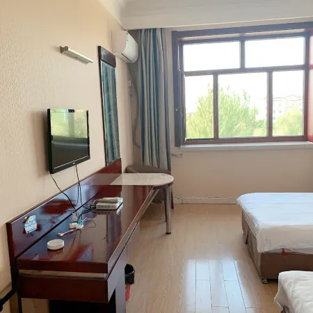 Jixi Wusuli Business Hotel