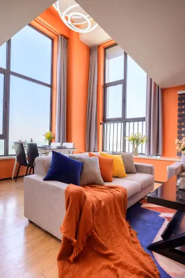 Yunhai Bay Ocean View LOFT Holiday Residence (Jinmao Mall, Qingdao Station) โรงแรมใกล้สถานีรถไฟชิงเต่า