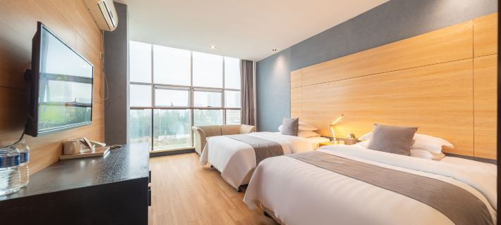 Paike Hotel (Rizhao Development Zone Rizhao Station) Отели в г. Ричжао