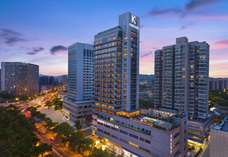 a glance, revealing the city's towering skyscrapers at Kasion K Hotel Yiwu