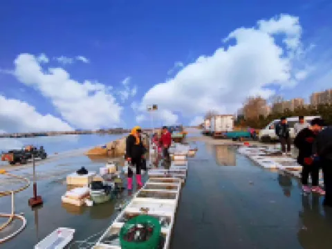 Caifu Building Apartment (Yantai Nanshan Yacht Club)