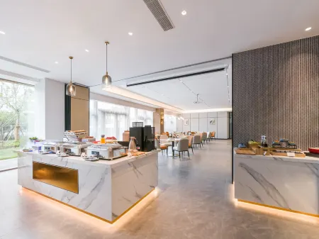 Magnolia Business Hotel (Jiaxing Nanhu Science and Technology City Branch) Отели рядом со станцией Jiaxing South Railway Station