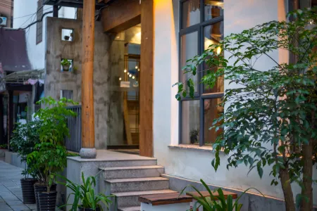 Yunmengqi Boutique Inn Отели рядом с достопримечательностью «Li Na's Villa»