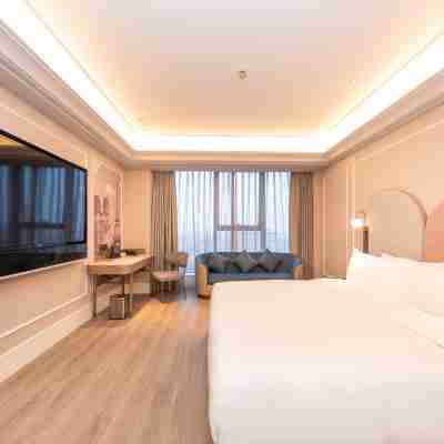 信陽東站美居酒店 Rooms