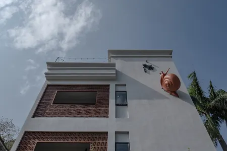 Qingxi Xiangshe woniu Hostel Отели рядом с достопримечательностью «Shenzhen Technology University»