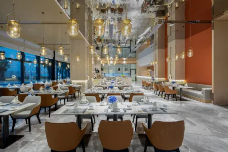 Maoming Ramada Hotel Отели в г. Маомин