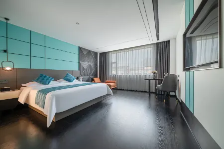 Doman Qingyue Hotel (Nanning East Railway Station Oriental Plaza) Отели рядом с достопримечательностью «Guangxi University of Foreign Languages»