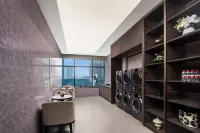 Maison New Century Hotel Huzhou - salle de sport