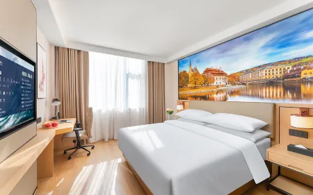 Vienna Hotel (Ningbo Longhu Yinzhou Tianjie Minglou Subway Station) Отели рядом с достопримечательностью «Ningbo University of Technology (East Campus)»