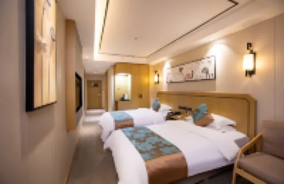 โรงแรมเยวเยว (จัตุรัสตะวันออกสถานีรถไฟถนนต้าถง เจิ้งโจว) โรงแรมใกล้จตุรัสซินเกอ