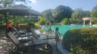 怡康民宿（國悅九曲灣店） 溫泉度假區住宿飯店