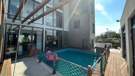 Leishu · Swimming Pool Vacation Lounge Homestay Отели рядом с достопримечательностью «Shanghai Astronomy Museum»