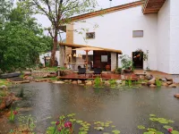 Chanahuage Homestay (Xinyang) Hotels near Shihegang Town