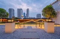 Moling Hotel (Zhuzhou Railway Station Wangfuxing Plaza) - parking