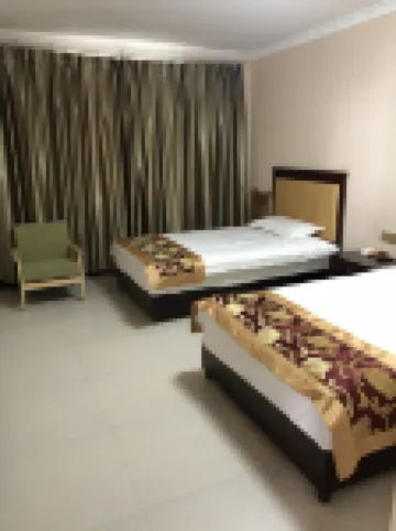 Junchen Inn Hoteles en 