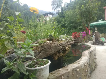 Yuyuan homestay Отели рядом с достопримечательностью «Renji Ximu Valley»