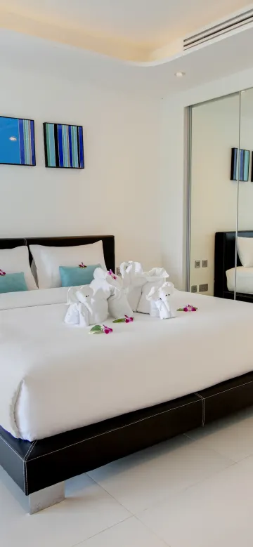 ห้องพักแบบหนึ่งห้องนอนพร้อมวิวทะเลบางส่วน