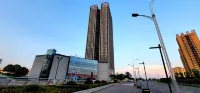 Time Apartment (Changjiang Normal University) Отели рядом с достопримечательностью «Брава-Площадь»