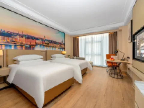 Vienna International Hotel (Genghong Avenue Branch, Gedian Development Zone) فنادق في أه جَو