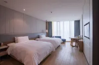 Earl Family Hotel (Changxing Central Plaza) - Esports