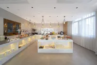 Yeste International Hotel (Qinzhou Pubei Aoyuan Zhengwuzhongxin) - breakfast
