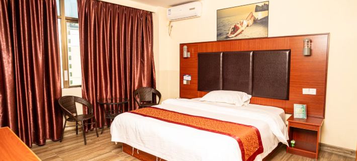 Tunchang Xintai Hostel โรงแรมในทุนฉาง
