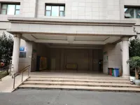 Liupanshui Qiuboju Homestay (Wanda Plaza) - parkir