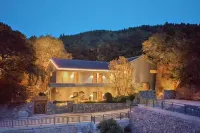 Gushu Meditation Mountain House (Xinmi Fuxi Mountain) Hotel berhampiran Jishan Sanfeng