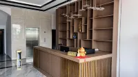 Mangshi Xinjia Homestay (Xinwanchang) - 주차장