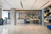 Echarm Hotel (Zhongxiang Railway Station Mochou Lake Road) - parking