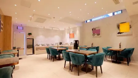 LANOU HOTEL（Taixing Wanda Square） Отели рядом с достопримечательностью «Drum Tower Square»