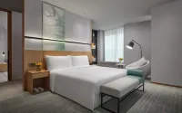 โรงแรมคิว-บ็อกซ์ ศูนย์แสดงสินค้า ซางชิว - ที่มีที่จอดรถ