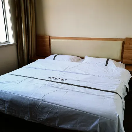 Xinghe Golden Tax Business Hotel