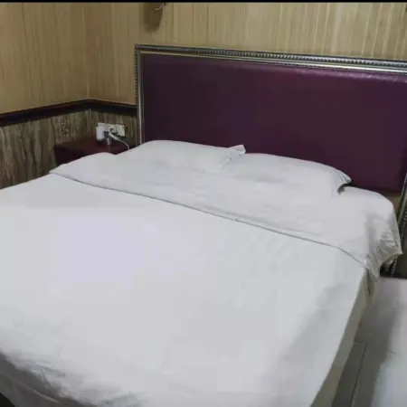 Yixin Inn Отели в г. Хэчжен