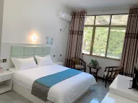 Asbestos Xiangfengju Inn