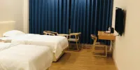 Gaozhou Shell Business Hotel - Deluxe Family Room