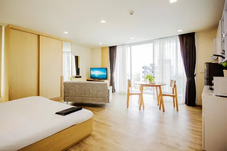Karin Hotel & Service Apartment Отели в г. Si Racha