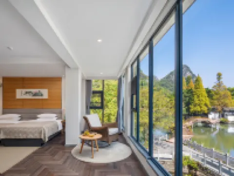 Heshe Lakeside Resort Hotels near Reed Flute Cave