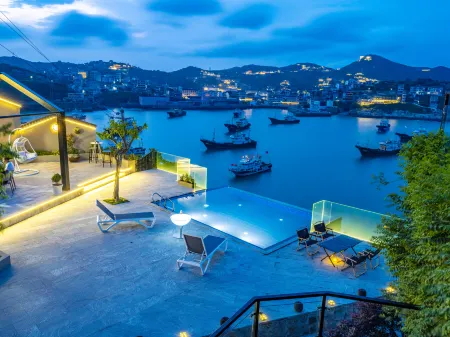 Between sky and sea Отели рядом с достопримечательностью «Wenling Shitang Peninsula Tourist Resort»