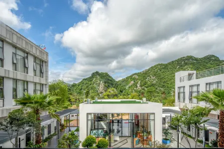 Yixi Cloud Hotel (Puzhehei Tourist Center Branch) Отели рядом с достопримечательностью «Qiubei Puzhehei Wetland Park»