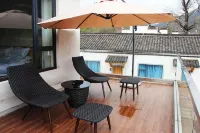 Taohuatan Xinyuan Homestay Taohua Tan Scenic Area 호텔