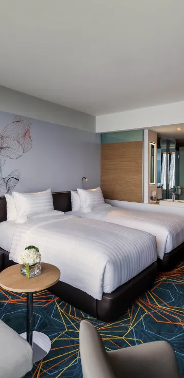 ห้องพรีเมียร์ดีลักซ์มีสิทธิ์เข้าใช้บริการเลานจ์ วิวทะเล - เตียงเดี่ยว 2 เตียง