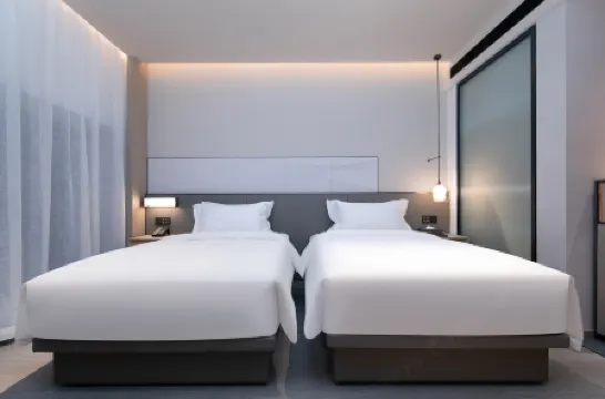 Wassim Hotel (Wuhan Tianhe Airport Aviation Headquarters Subway Station)