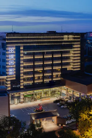 POSHER HOUSE Отели рядом с достопримечательностью «Xinjiang University of Engineering (Tianjin Road Campus)»